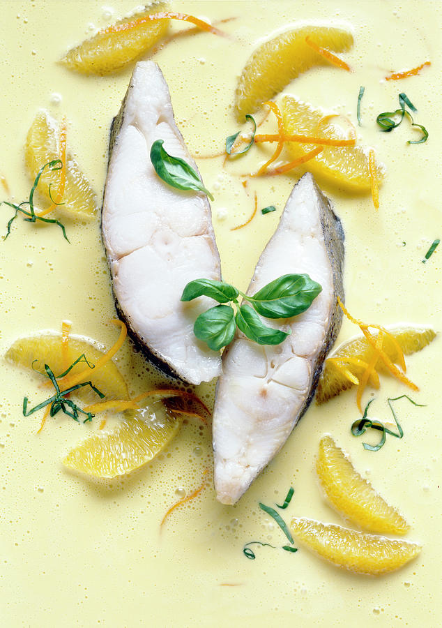 Halibut With Orange basil Sauce And Orange Segments Overhead View