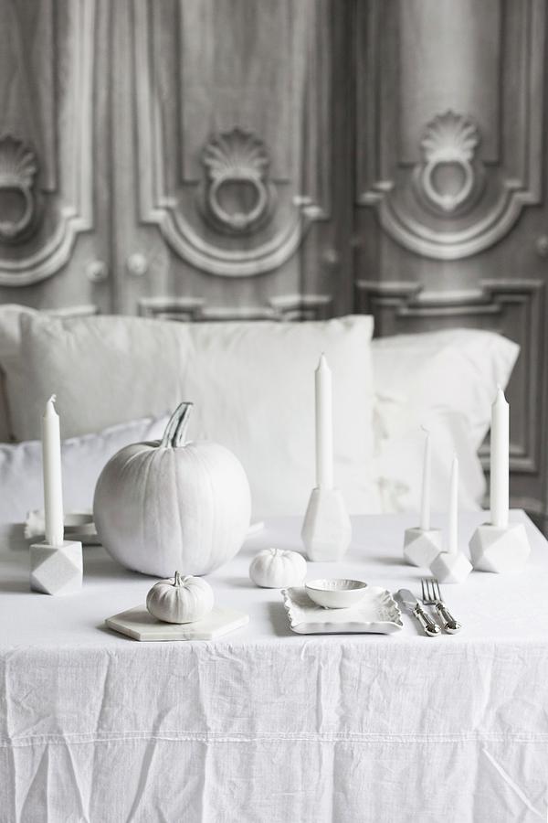 Halloween Arrangement Of White Pumpkins And Candles On Table Photograph by Annette Nordstrom