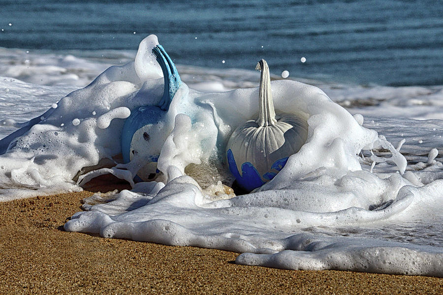 Halloween Blue and White Pumpkins in the Surf Photograph by Bill Swartwout