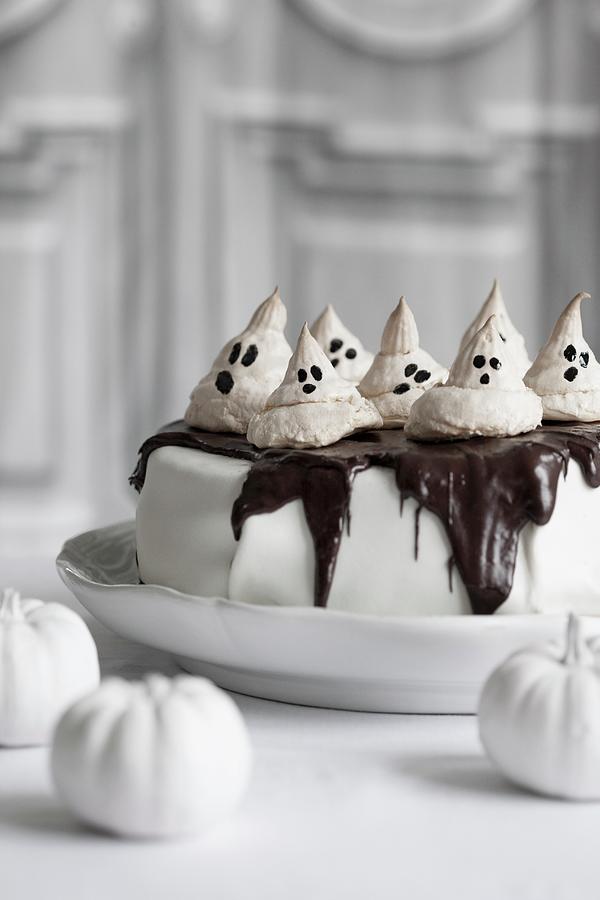 Halloween Cake Topped With Meringue Ghosts Photograph by Annette Nordstrom