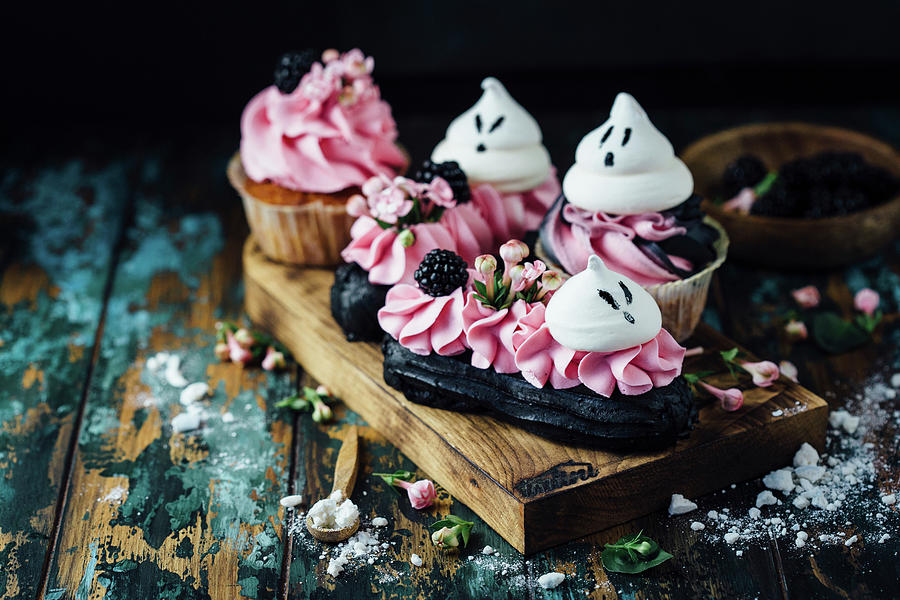 Halloween Cupcakes And Eclairs Photograph by Kate Prihodko