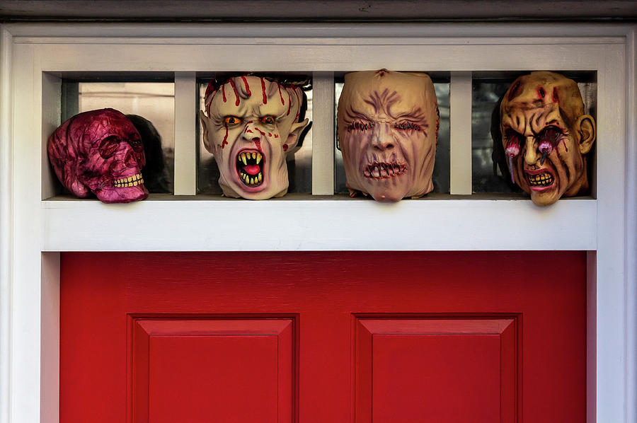 Halloween Decorations in Doorway Photograph by Robert Ullmann