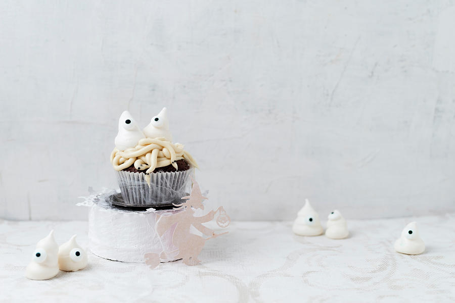 Halloween Meringue Ghosts On A Cupcake With Worms Photograph by Mandy Reschke