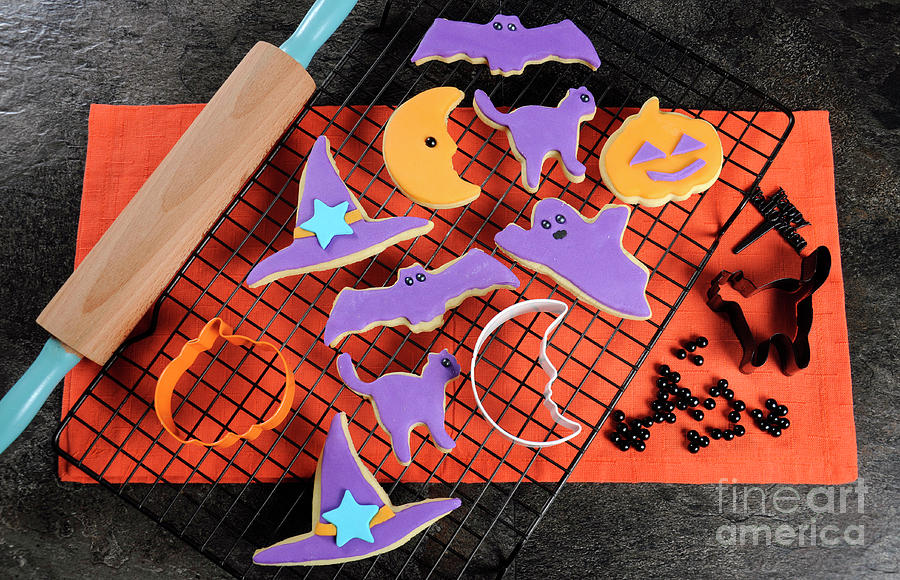 Halloween orange and purple sugar cookies  Photograph by Milleflore Images