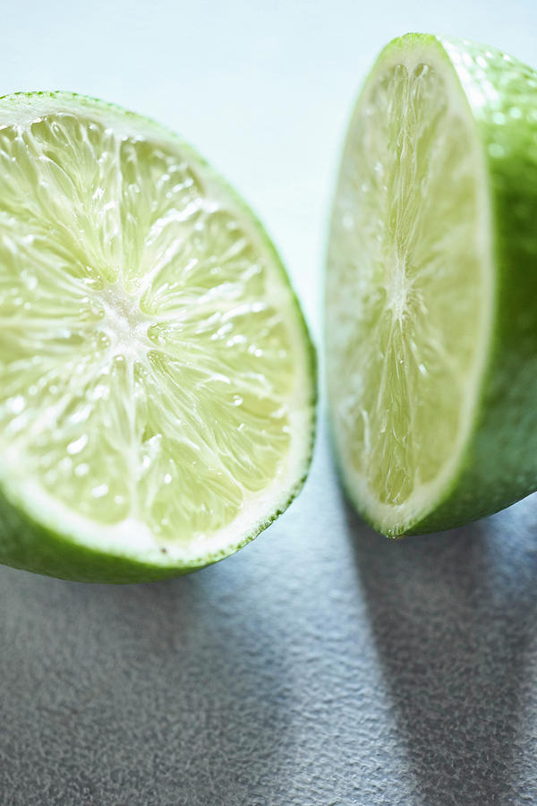 Halved Lime close-up Photograph by Oliver Brachat