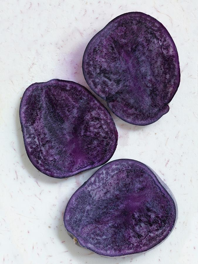 Halved Purple Potatoes seen From Above Photograph by Antonis Achilleos