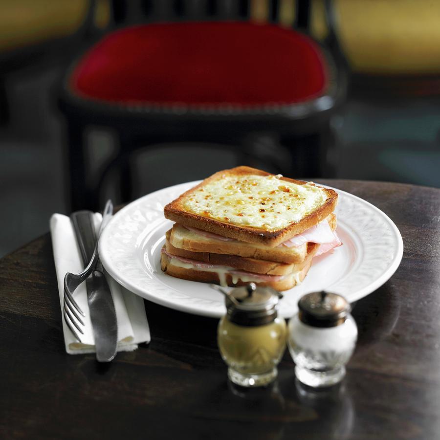 Bread Photograph - Ham And Cheese Toasted Sandwich Topped With Grilled Cheese by Radvaner