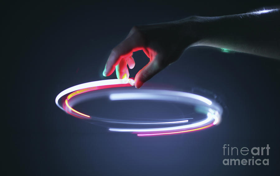 Hand Controling Light Circle In Air Photograph by Stanislaw Pytel