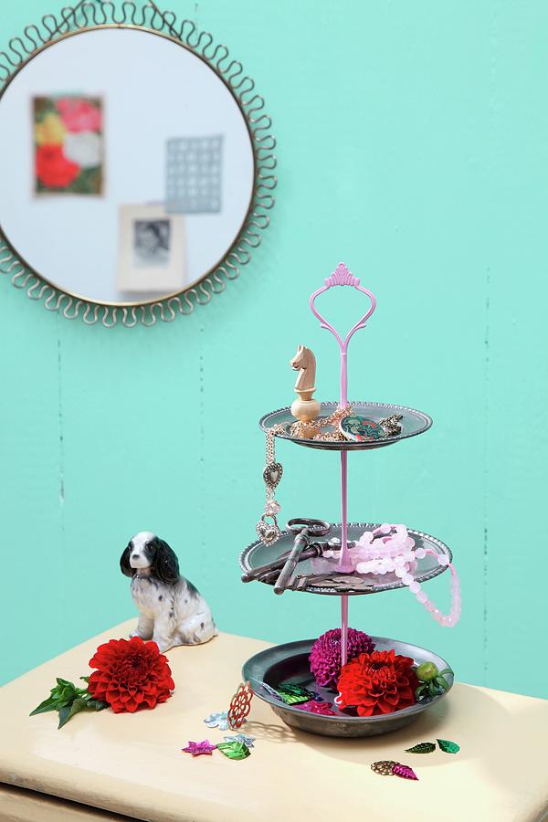 Hand-crafted Cake Stand Made From Pewter Plates And Used To Display Keys And Flowers Photograph by Thordis Rggeberg