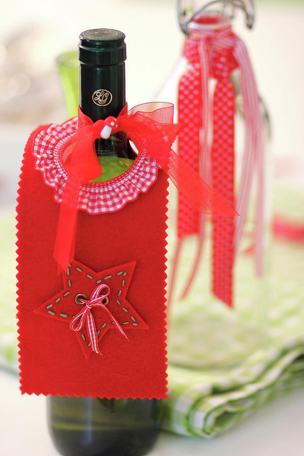 Hand-crafted, Festive, Felt Bottle Collar On Wine Bottle As Drip Catcher Photograph by Ruth Laing