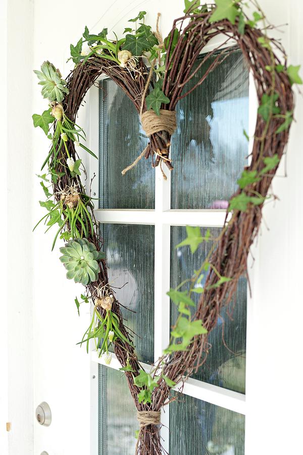 Hand-crafted, Heart-shaped Wreath Made From Birch Twigs And Ivy Photograph by Cecilia Mller