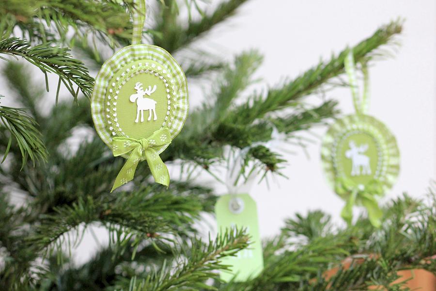 Hand-crafted, Rosette Christmas Tree Decorations With Moose Motifs & Ruffled Ribbon Photograph by Ruth Laing