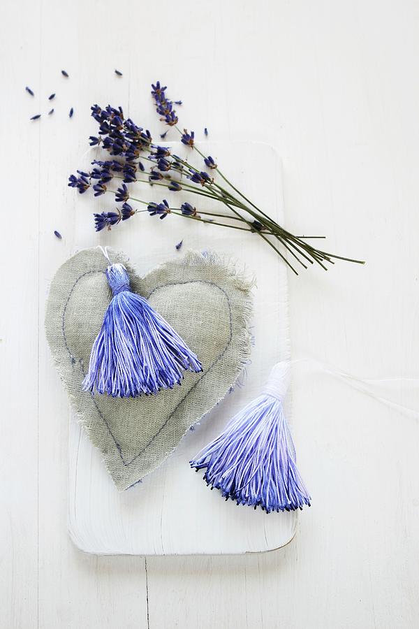 Hand-dyed Tassels On Fabric Heart And Lavender Flowers Photograph by Regina Hippel