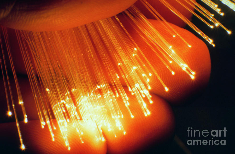 Hand Holding Spray Of Polymer Optical Fibres Photograph by John Walsh/science Photo Library