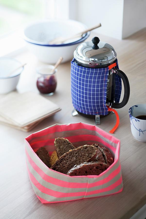 Hand-made Fabric Bread Basket And Coffee Pot Cosy Photograph by Bjarni B. Jacobsen