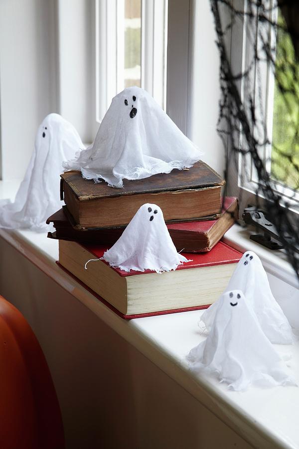 Hand-made Halloween Ghost Decorations Photograph by Simon Scarboro
