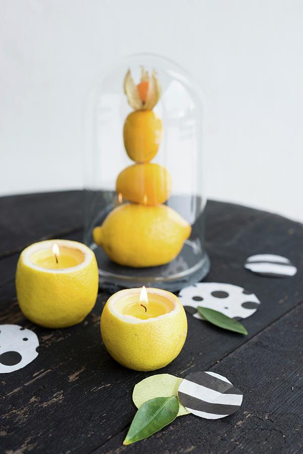 Hand-made Lemon Candle Holders And Confetti Decorating Table Photograph by Ulla@patsy