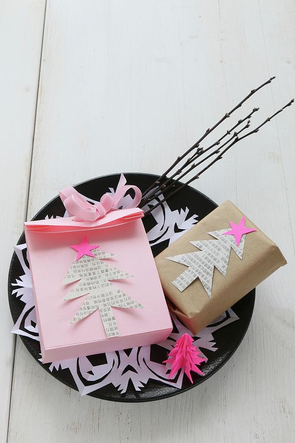 Hand-made, Pink Paper Bag And Gift Decorated With Paper Christmas Trees On Plate With Doily And Twigs Photograph by Regina Hippel