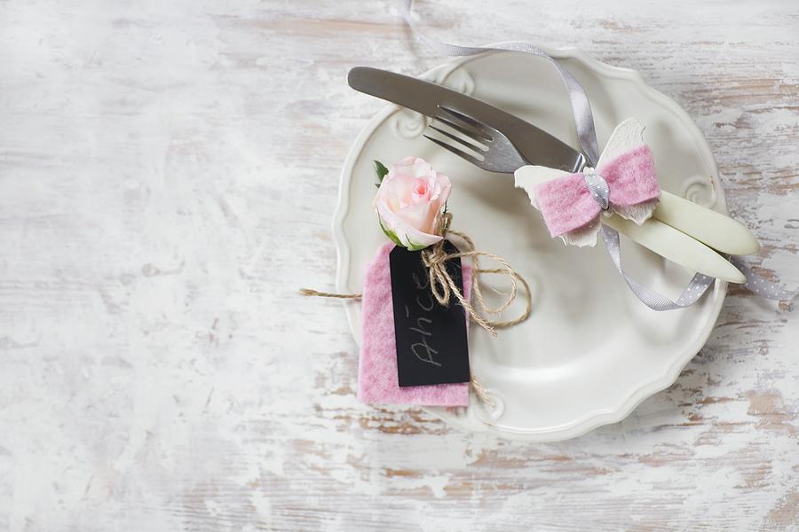 Hand-made Place Card Made From Black Cardboard, Pink Felt And Pink Flower Next To Cutlery Decorated With Felt Butterfly Photograph by Alicja Koll