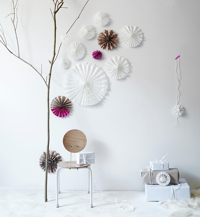 Hand-made, Pleated Paper Stars With Cut-out Patterns As Festive Wall Decorations Photograph by Andreas Hoernisch