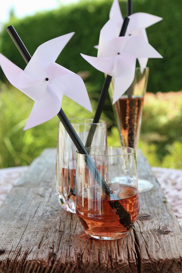 Hand-made Windmills On Drinking Straws Decorating Glasses For Garden Party Photograph by Regina Hippel