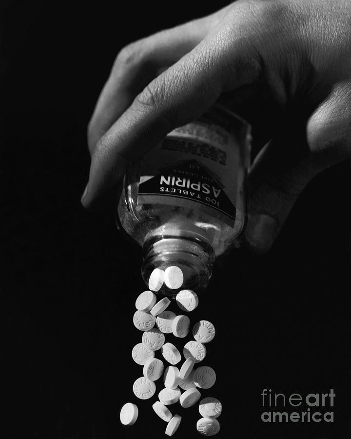 Hand Pouring Aspirin From Bottle Photograph by Bettmann