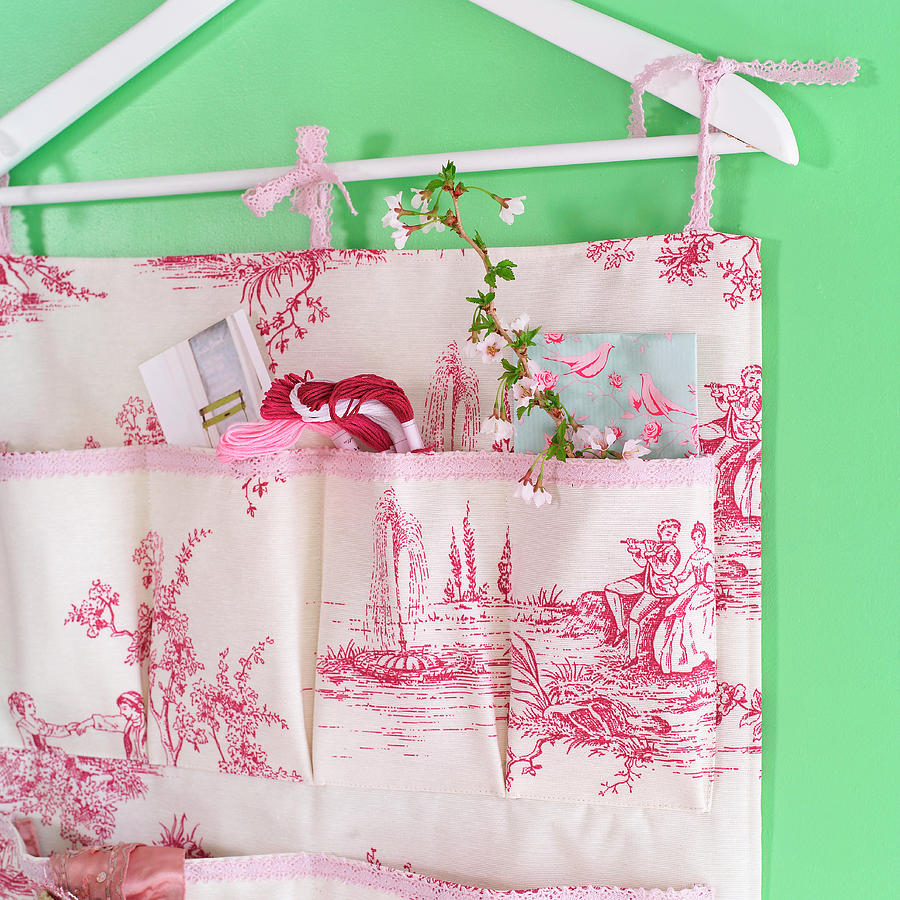 Hand-sewn Organiser Made From Toile-de-jouy Fabric Hanging From Clothes Hanger Photograph by Flowers & Green