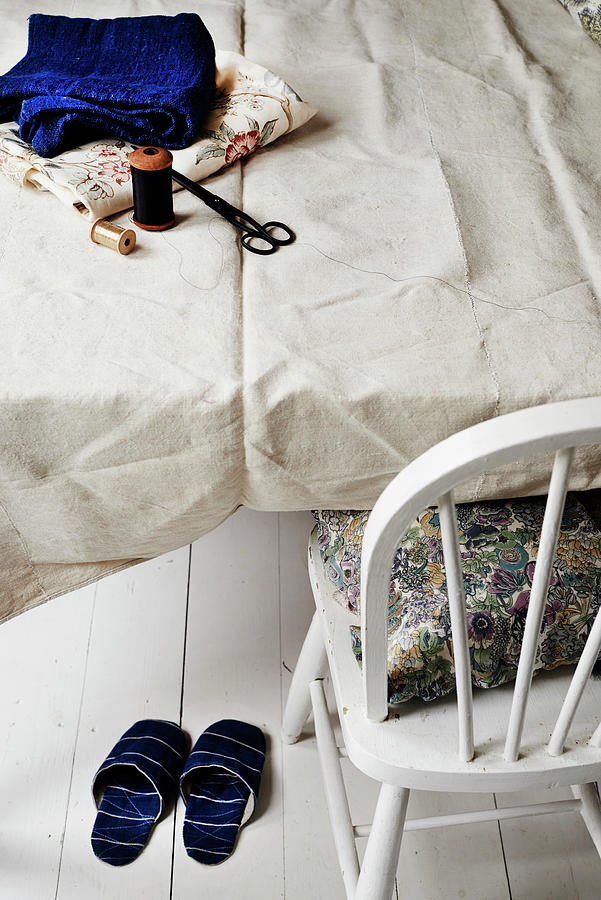 Hand-sewn Slippers Under Sewing Utensils On Table Photograph by Catherine Gratwicke