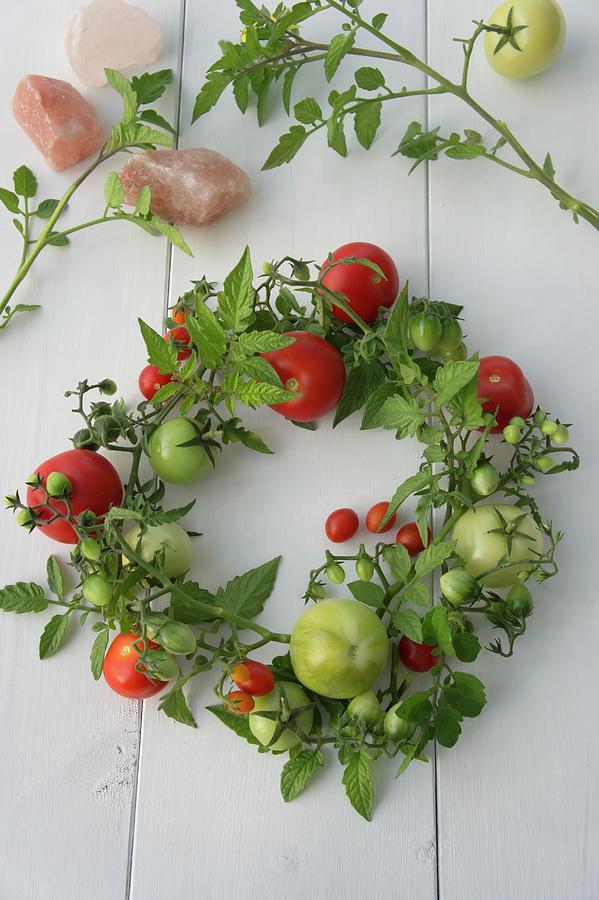Hand-tied Wreath Of Tomatoes And Tomato Branches Photograph by Martina Schindler