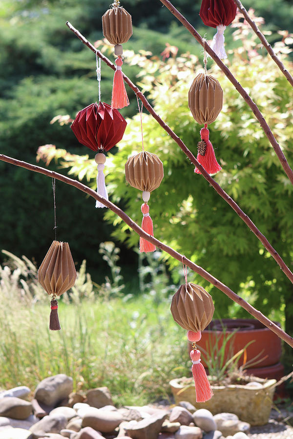 Handmade Brown Paper Pendants With Tassels As Decorations For Garden Party Photograph by Regina Hippel