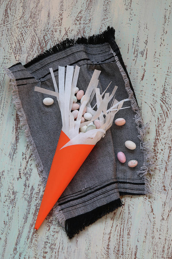 Handmade Cone With Fringe Holding Small Easter Eggs Photograph by Regina Hippel