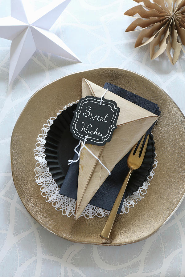 Handmade Paper Cone With Motto On Christmas Place Setting With Golden Plate Photograph by Regina Hippel