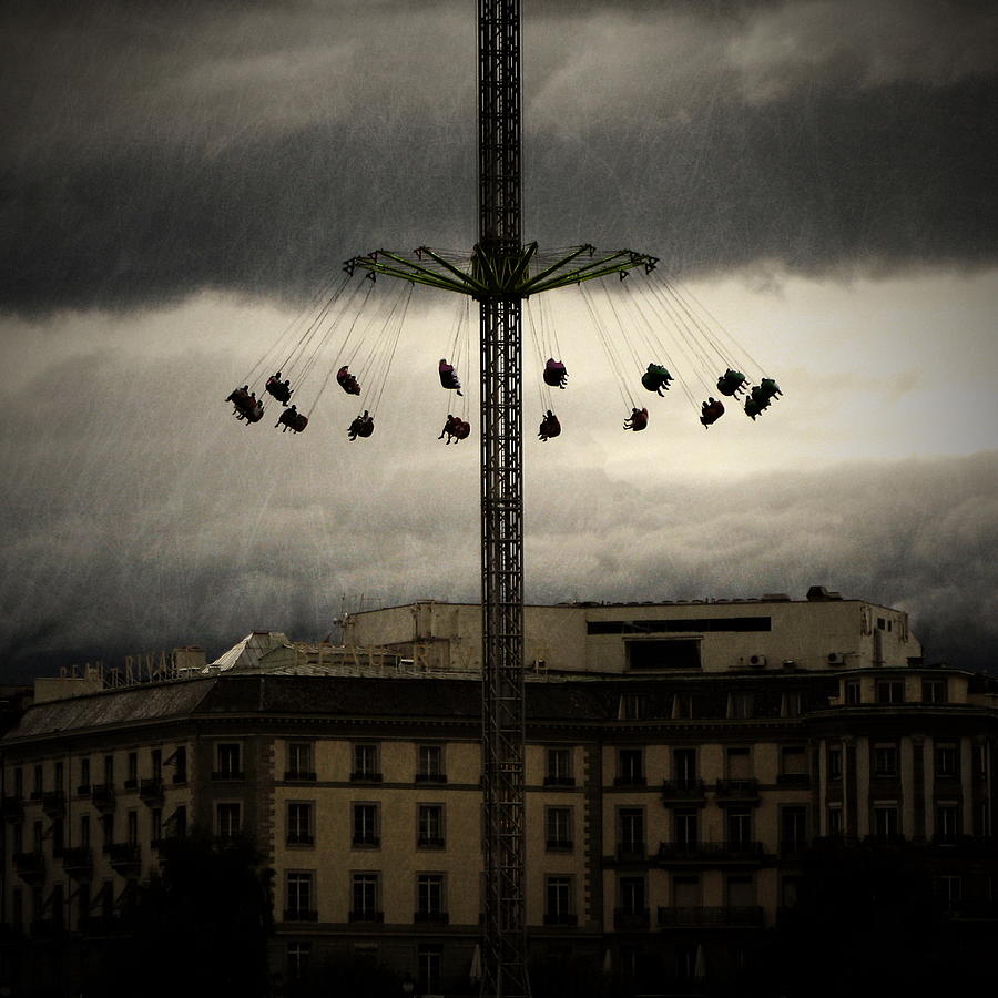 Wheel Photograph - Hanging From The Sky by Vangelis Bagiatis