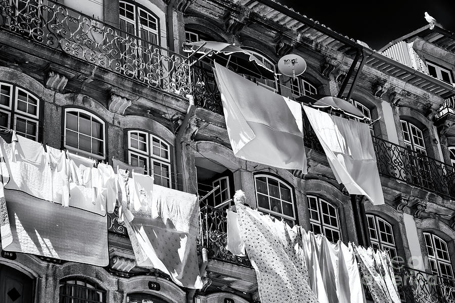 Hanging Laundry in Porto Photograph by John Rizzuto
