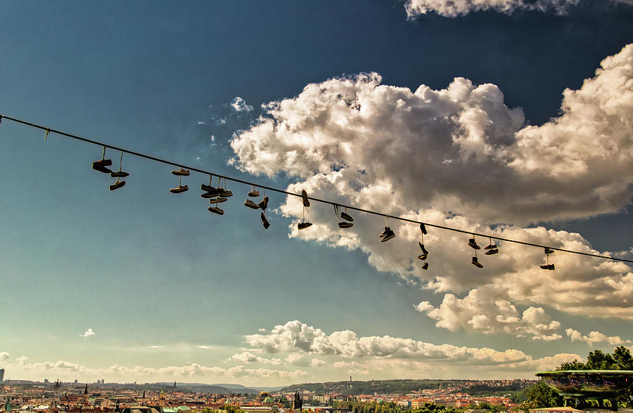 hanging shoes on Prague Photograph by Vivida Photo PC