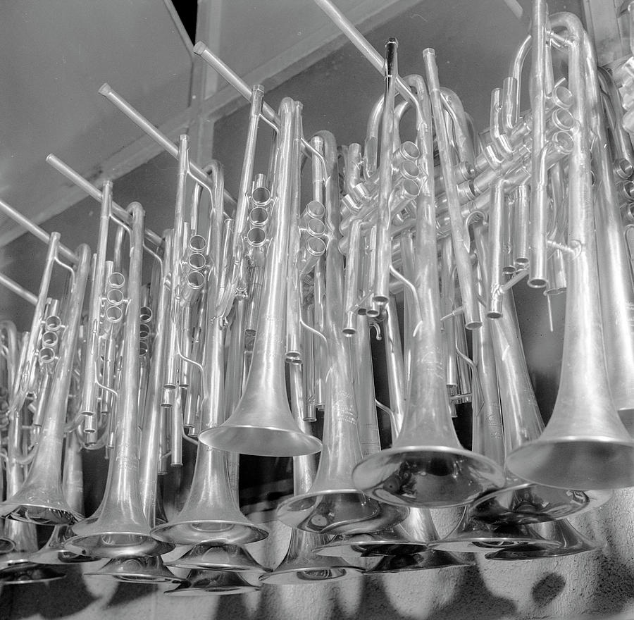 Music Photograph - Hanging Trombones by Orlando