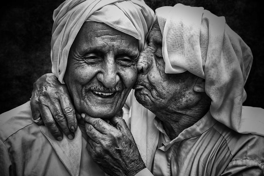 Black And White Photograph - Happiness Of Men by Hameed Almakhlooq