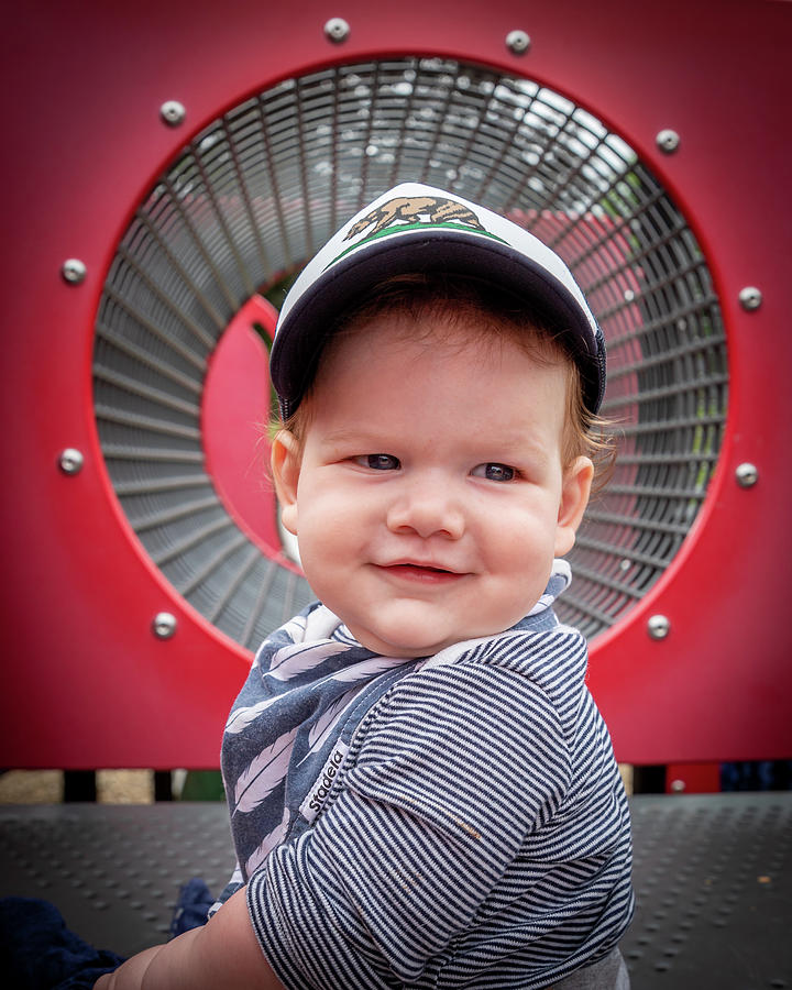 Happy Baby Boy Smiling On The Playground Structure. Photograph by Cavan ...