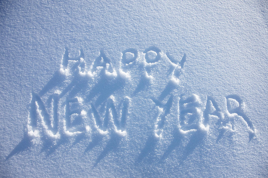 Happy New Year Written In Snow Photograph by Jakob Helbig