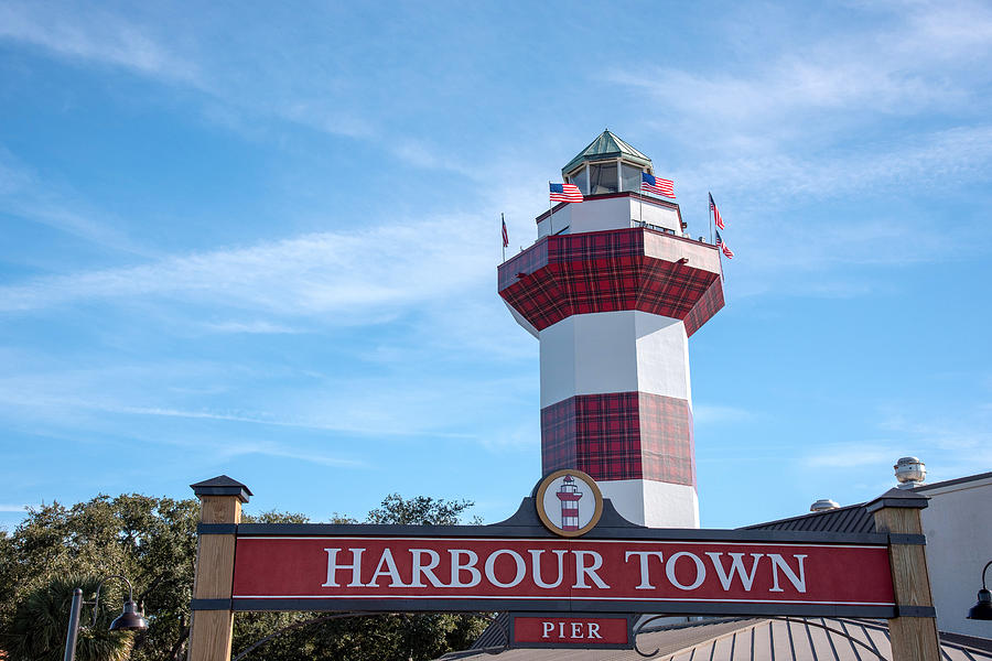 Harbour Town Lighthouse and pier sign Photograph by Dennis Schmidt