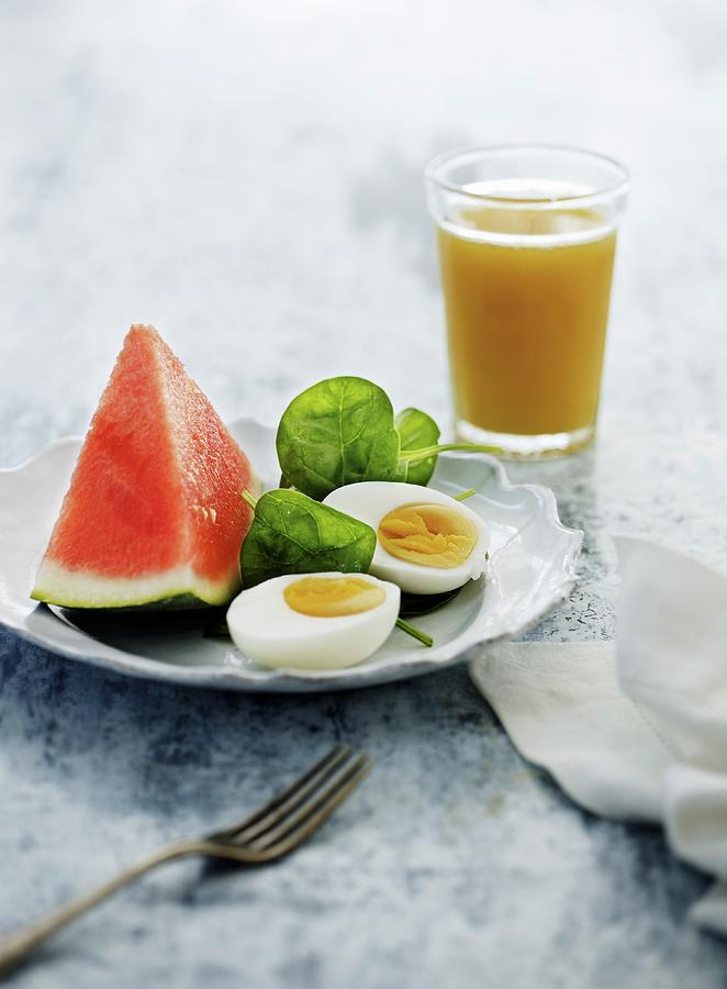 Hard Boiled Eggs With Watermelon And Fruit Juice Photograph by Mikkel Adsbl