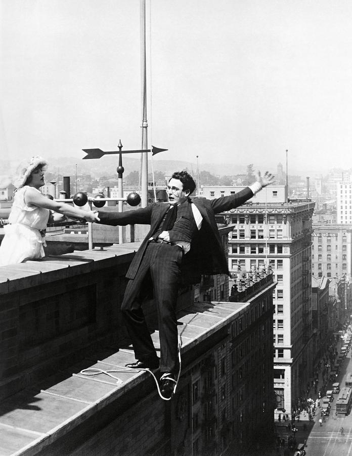 HAROLD LLOYD and MILDRED DAVIS in SAFETY LAST -1923-. Photograph by Album