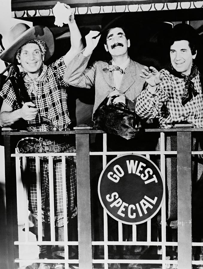 HARPO MARX , THE MARX BROTHERS , CHICO MARX and GROUCHO MARX in GO WEST -1940-. Photograph by Album