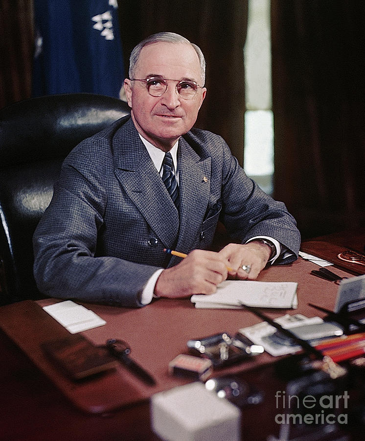 Harry S. Truman At Desk Holding Pencil Photograph by Bettmann