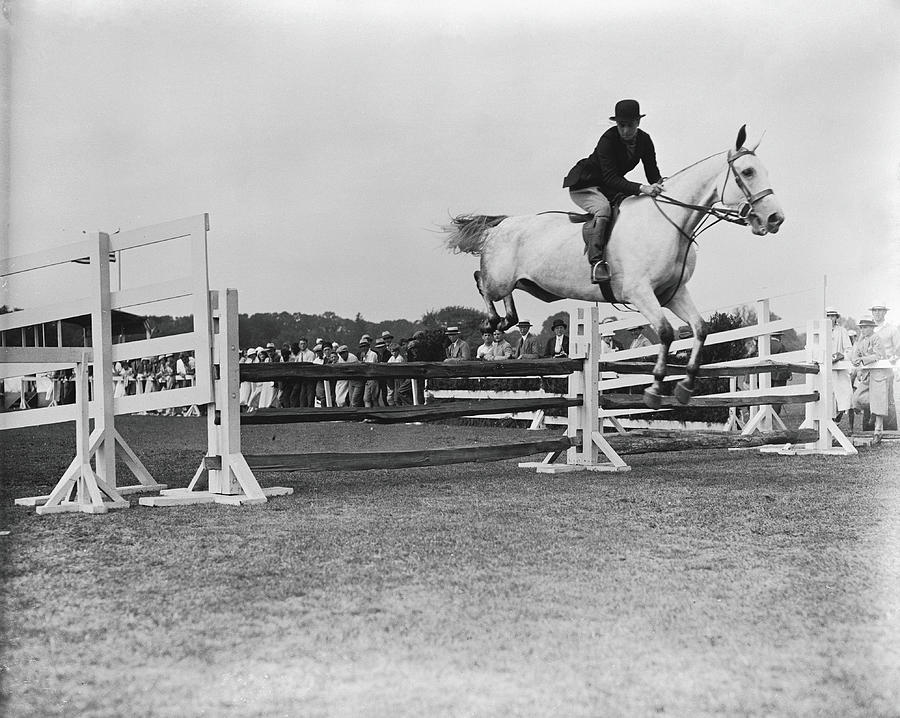 Hasler & Horse In Mid Jump Photograph by Bert Morgan