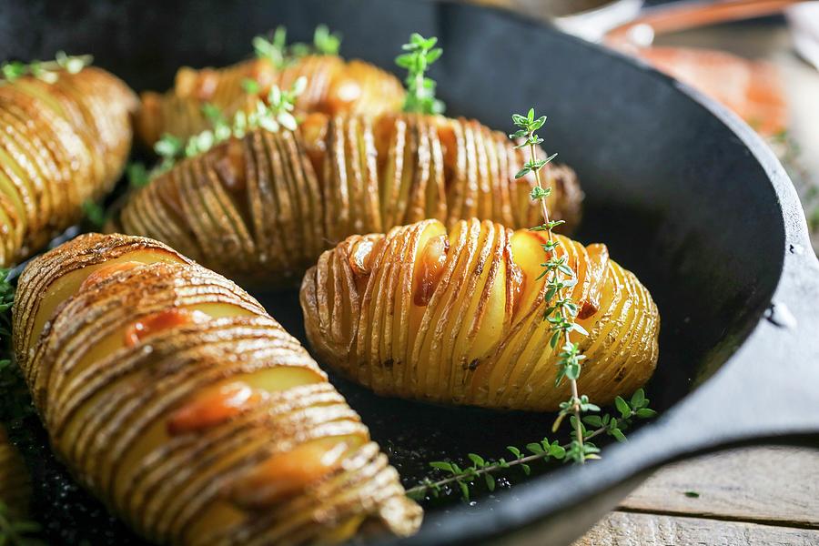 Hasselback Potatoes In A Frying Pan Photograph by Emily Clifton