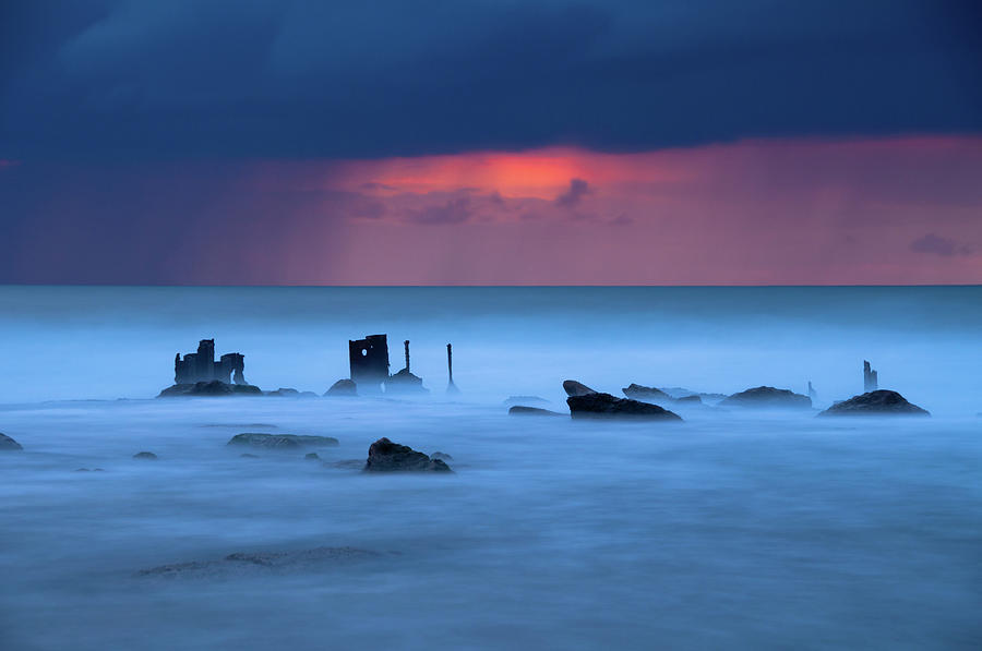 Haunting Looking Sea And Wrecks At Photograph by Ilan Shacham