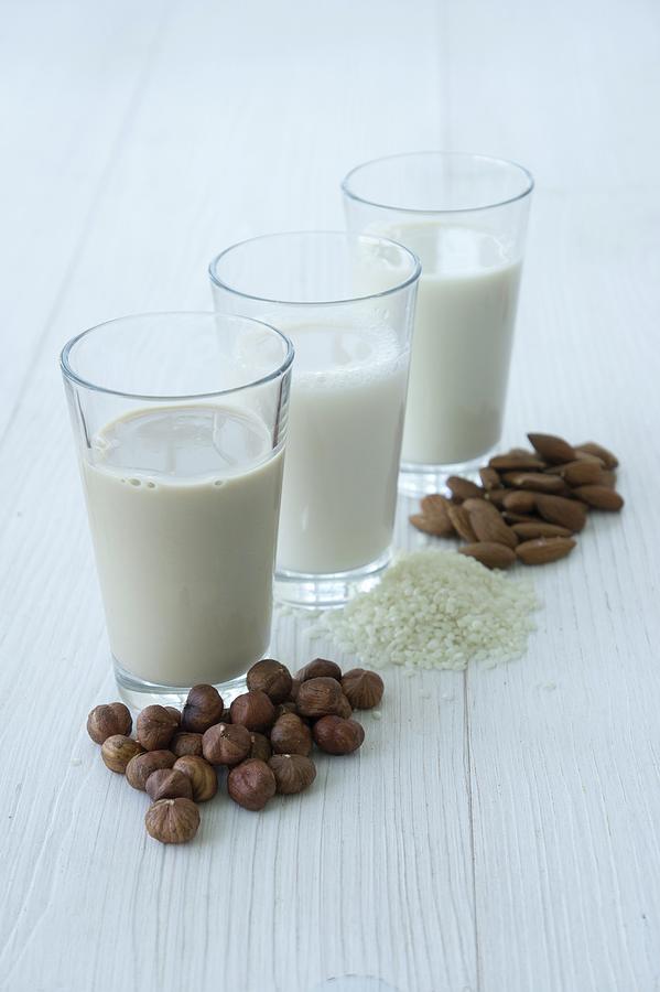Hazelnuts And Hazelnut Milk, Rice And Rice Milk, Almonds And Almond Milk Photograph by Martina Schindler