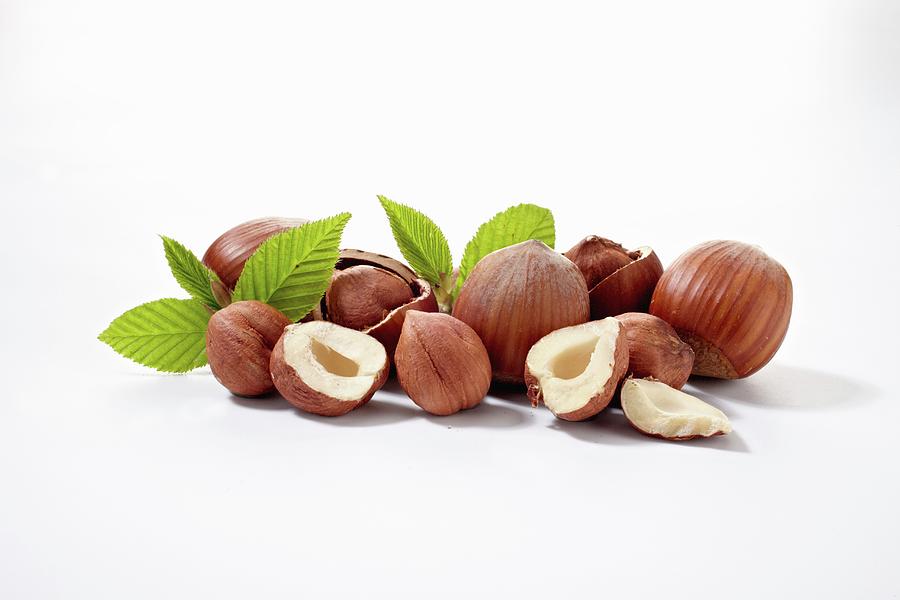 Hazelnuts With Leaves Photograph by Alessandra Pizzi