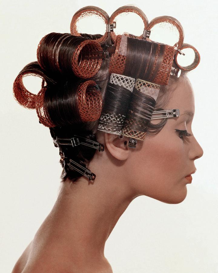 Head Full Of Hair Rollers Photograph by Lionel Kazan